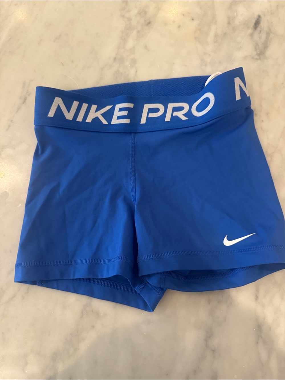 Nike Pro Royal Blue Athletic Shorts with White Swoosh